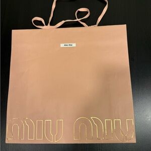 Miu Miu Blush Pink Bag with Gold Logo